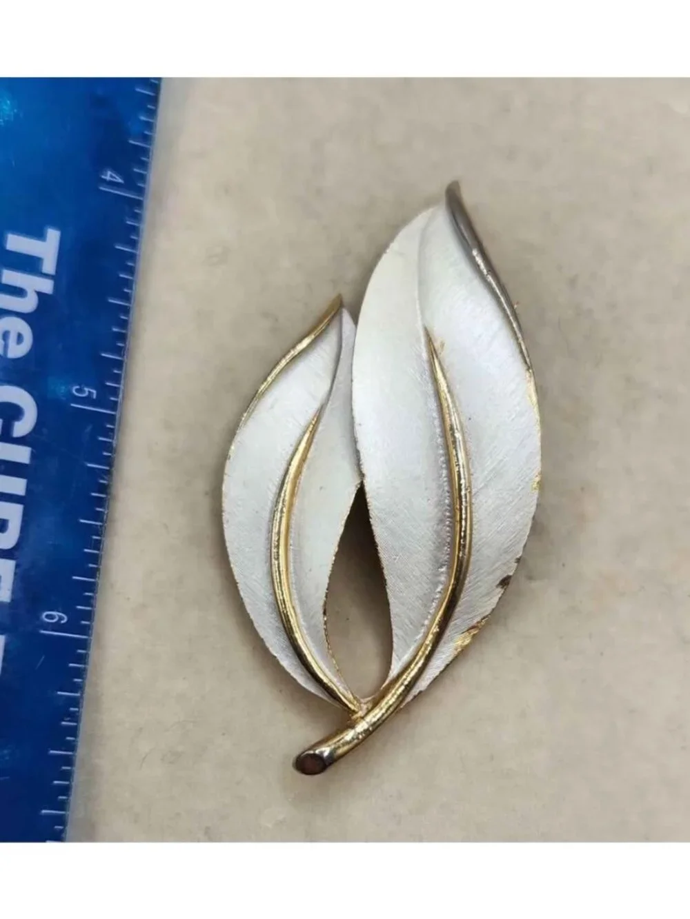 Sarah Coventry Gold Tone White Enamel Double Leaf Brooch